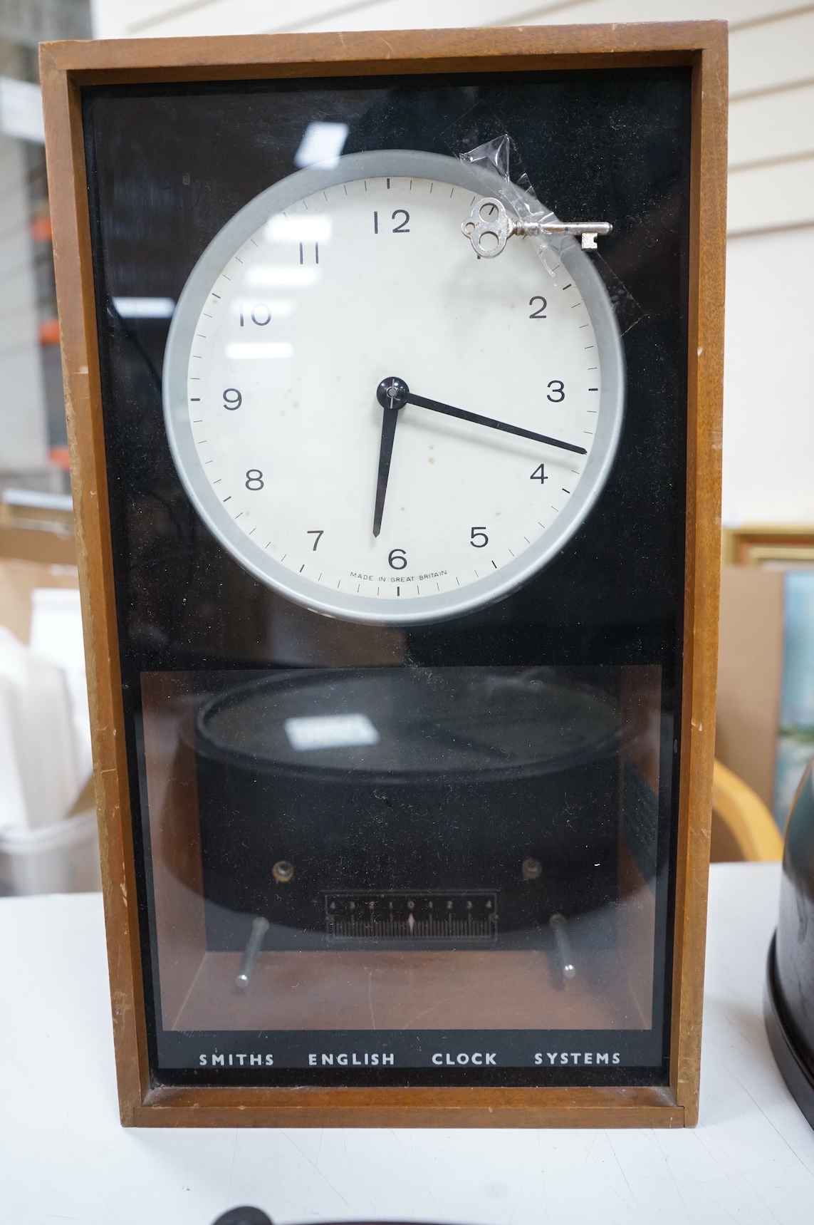 A Smiths Symchrome master clock, 41cm high